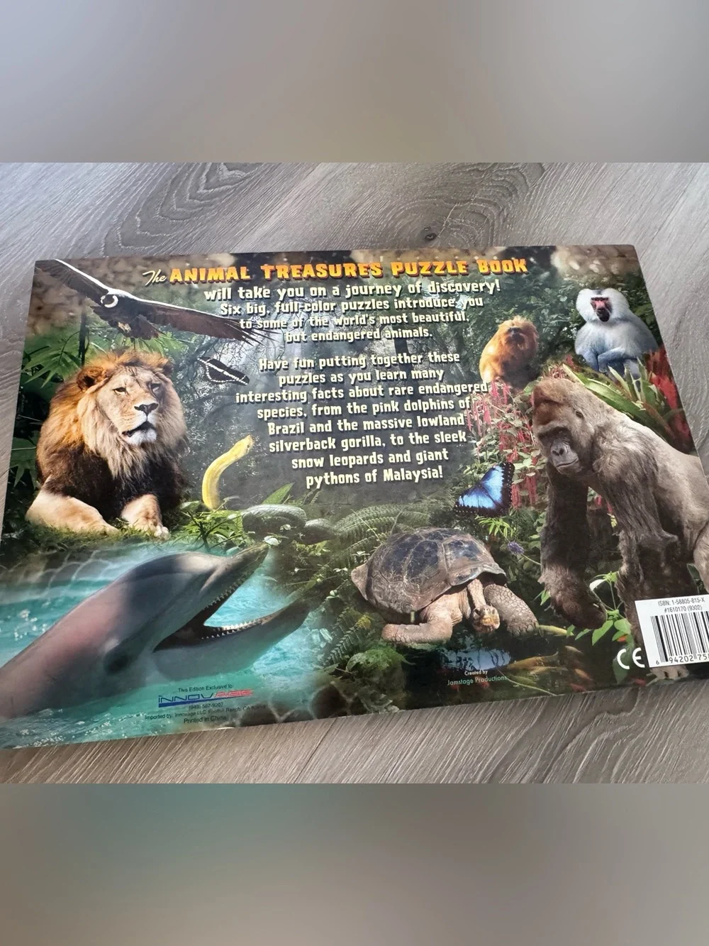 Animal treasures large puzzle book featuring endangered animals